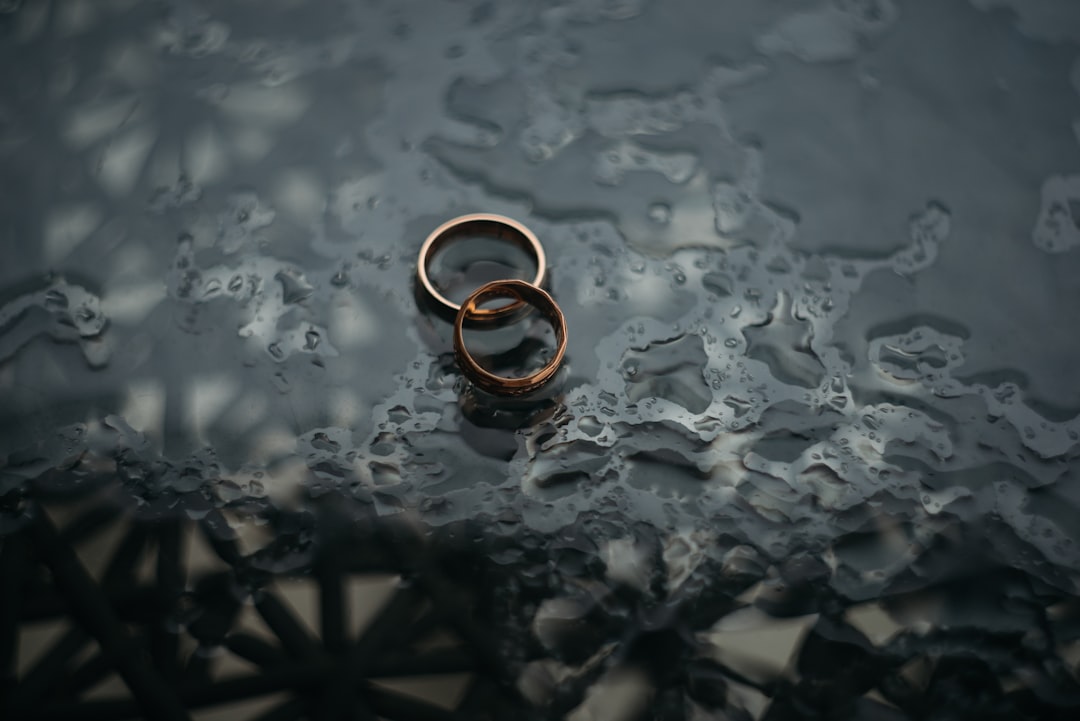two bronze-colored rings two bronze-colored rings