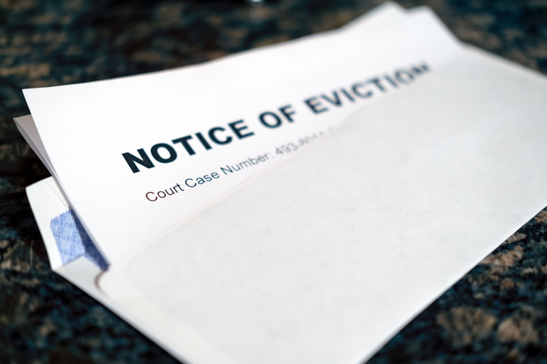 a close up of a piece of paper with a notice of eviction on it a close up of a piece of paper with a notice of eviction on it
